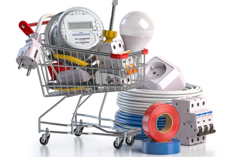 Shopping cart full of electrical components and equipment isolated on white. 3d illustration